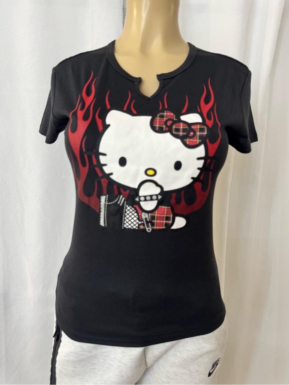 Hello Kitty Black Tee with Red Flame Graphic and Plaid Bow
